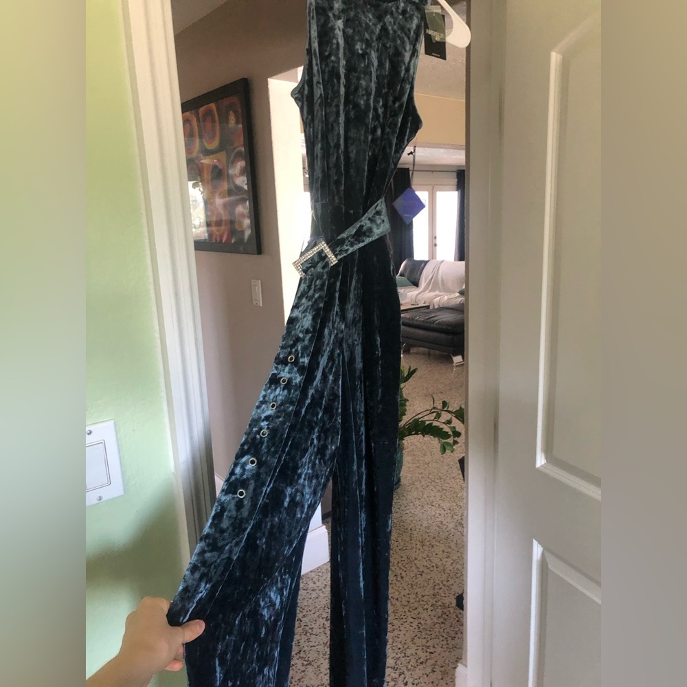 NWT faux velvet blue jumpsuit size S (small) from Forever21